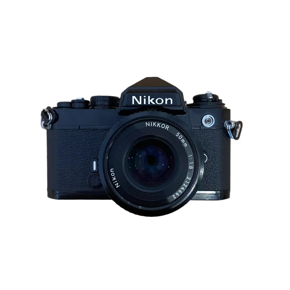 nikon-fe-spiegelreflexkamera-mit-nikkor-50mm-f-1-8-kit image 1