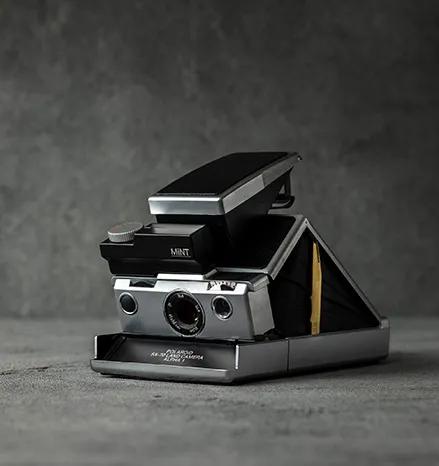 mint-slr670-s-schwarz-polaroid-kamera-sofortbildkamera image 1