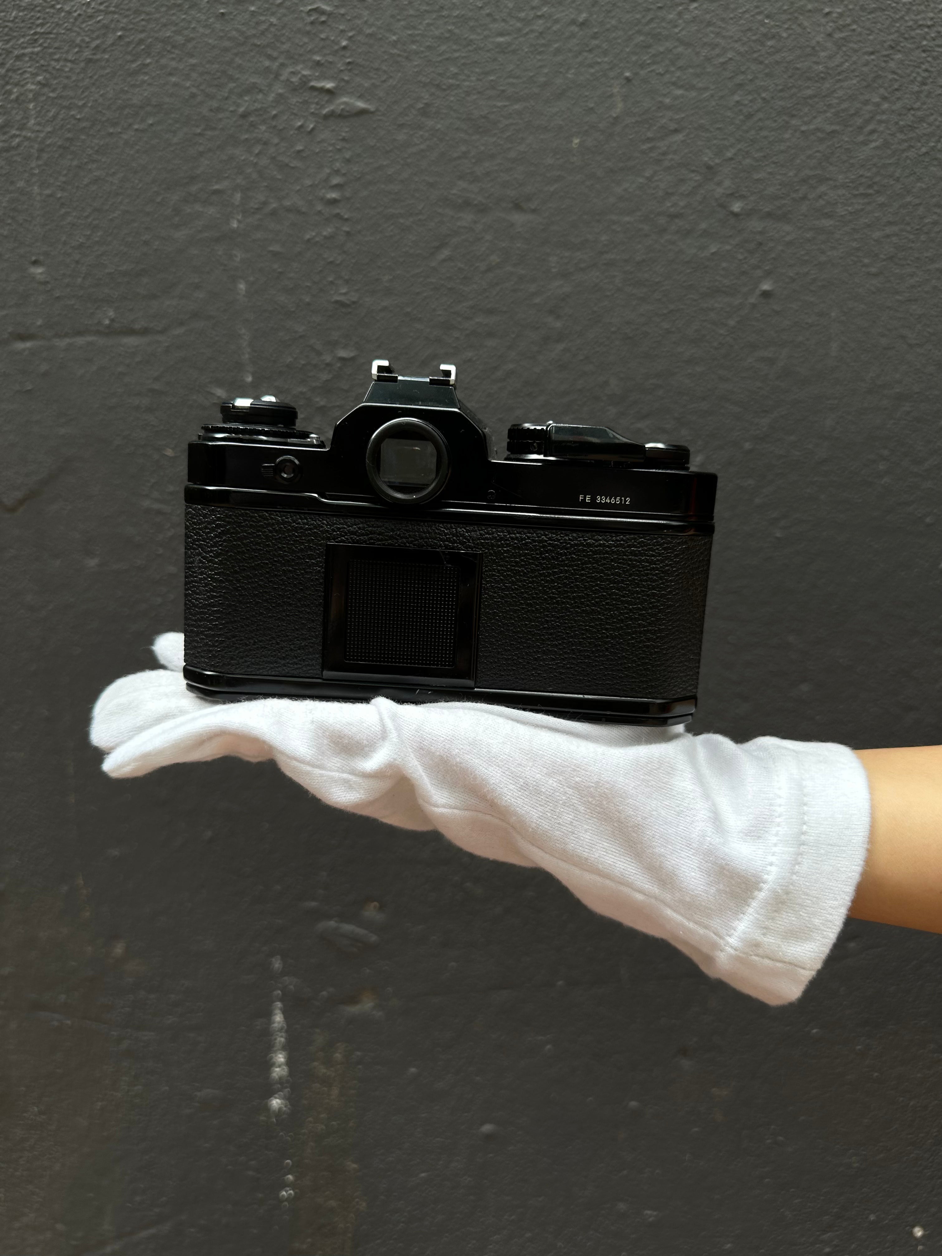 nikon-fe-spiegelreflexkamera-mit-nikkor-50mm-f-1-4 image 3