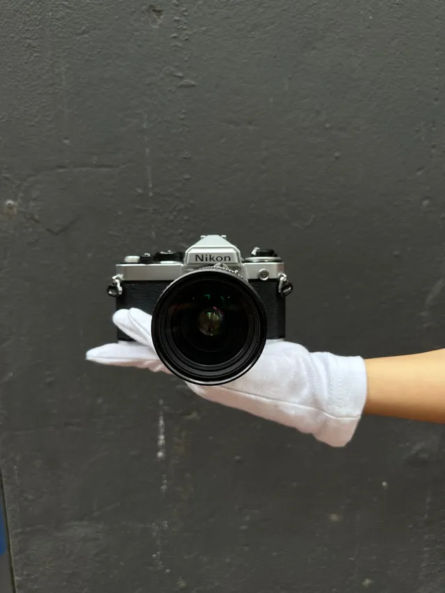 nikon-fe-spiegelreflexkamera-schwarz-mit-nikkor-28-85mm-zoom image 1