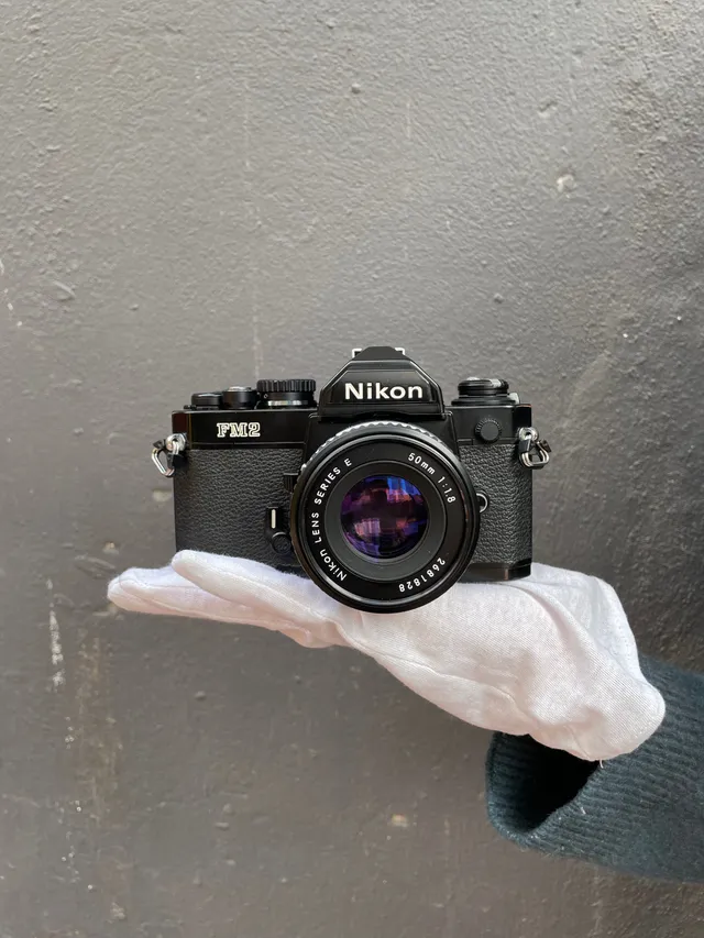 nikon-fm2-slr-35mm-analogkamera-nikkor-50mm-1-8-bel-defekt image 1