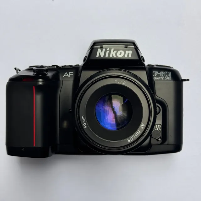 nikon-f-601-slr-kamera-35mm-mit-nikkor-50mm-f-1-8-kit image 1