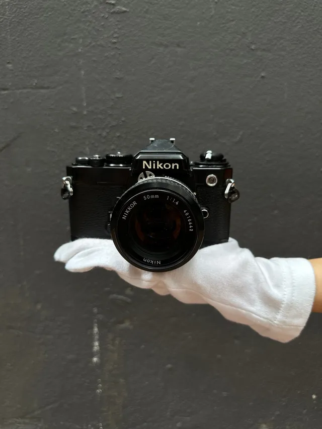 nikon-fe-spiegelreflexkamera-mit-nikkor-50mm-f-1-4 image 1