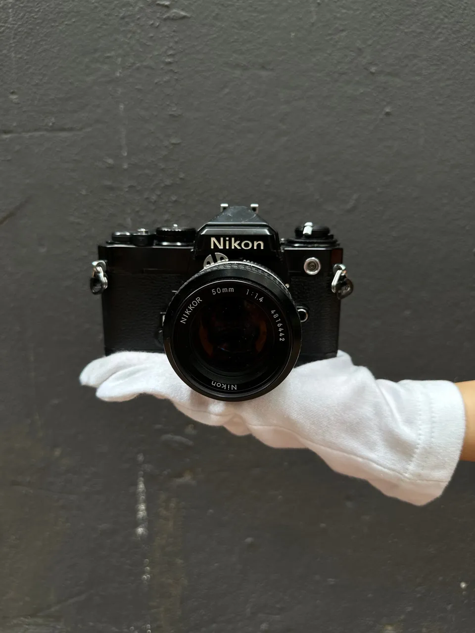 nikon-fe-spiegelreflexkamera-mit-nikkor-50mm-f-1-4 image 1