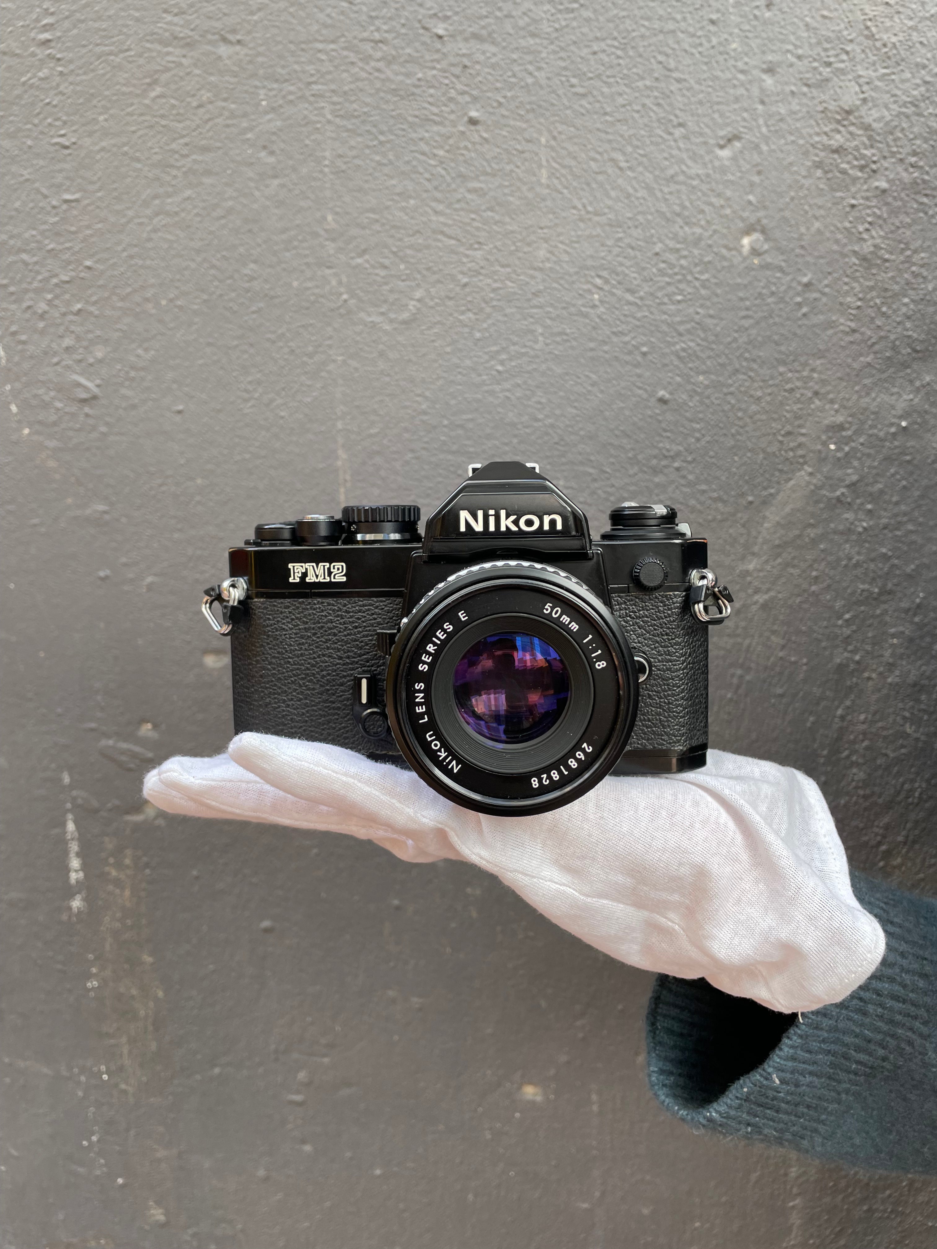 nikon-fm2-slr-35mm-analogkamera-nikkor-50mm-1-8-bel-defekt image 1