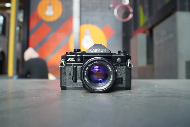 canon-a-1-slr-filmkamera-35mm-mit-fd-50mm-f-1-4-objektiv image 1