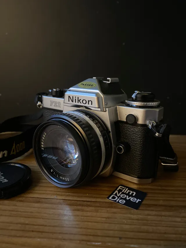 nikon-fe2-slr-analogkamera-35mm-mit-nikkor-50mm-f1-8-kit image 1