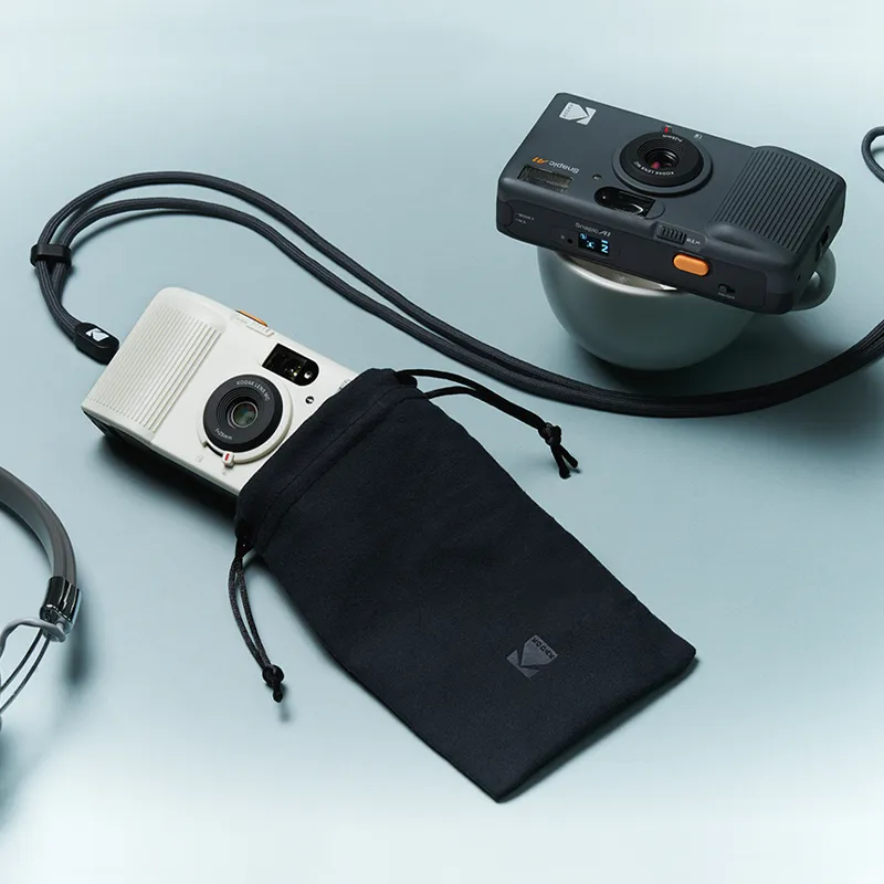 kodak-snapic-a1-35mm-filmkamera-glasobjektiv-wei-doppelbel image 1